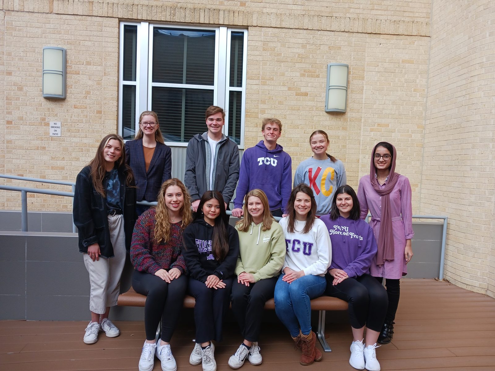 Stewart Lab group photo outside the science building